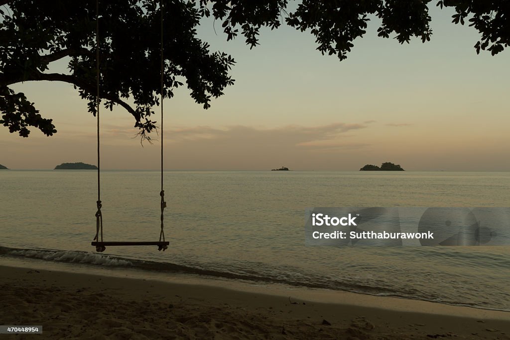 Swing on the beach at the morning Swing on the beach at the morning, koh Chang Island, Thailand 2015 Stock Photo