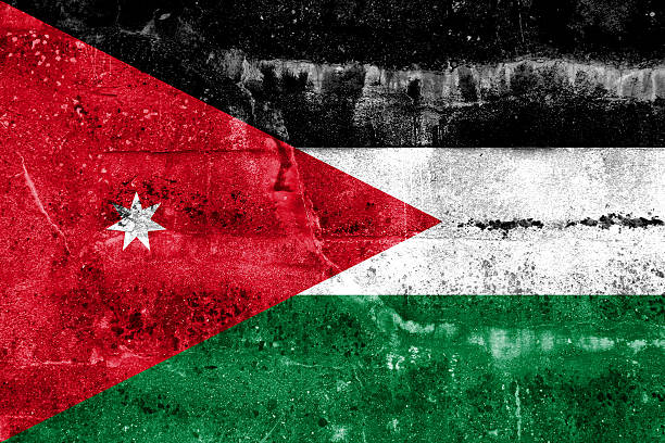 istock Jordan Flag painted on grunge wall 470449417