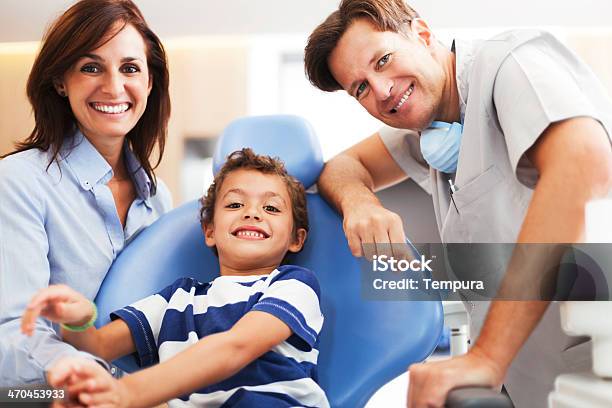 Motehr And Son At The Dentist Office Stock Photo - Download Image Now - Dentist, Family, Child