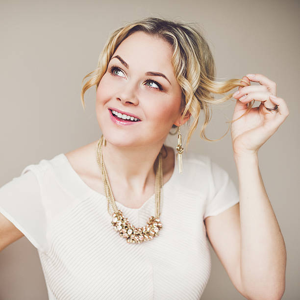 istock Happy woman indoors 470453971