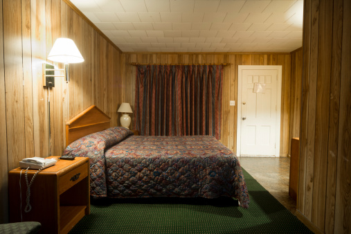Barato motel cama de la habitación photo