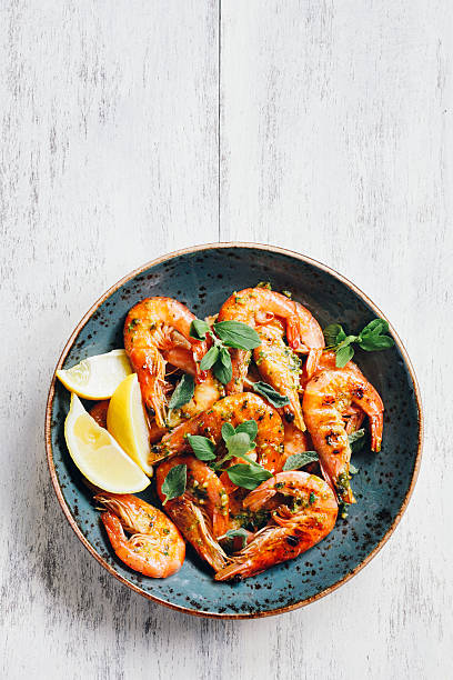 Prawns with chimichurri King prawns with chimichurri prawn grilled seafood prepared shrimp stock pictures, royalty-free photos & images