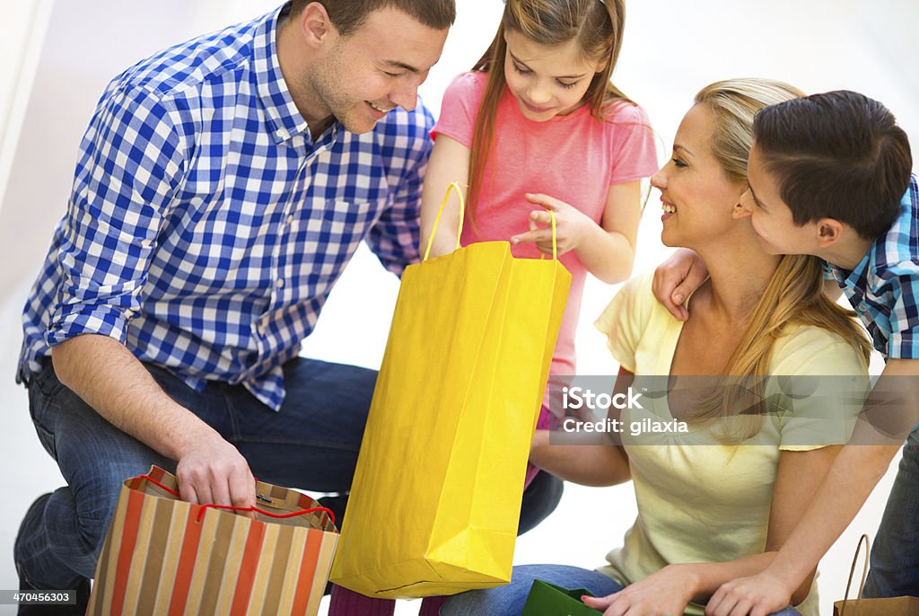 Family in shopping together. Happy family in shopping mall 30-39 Years Stock Photo