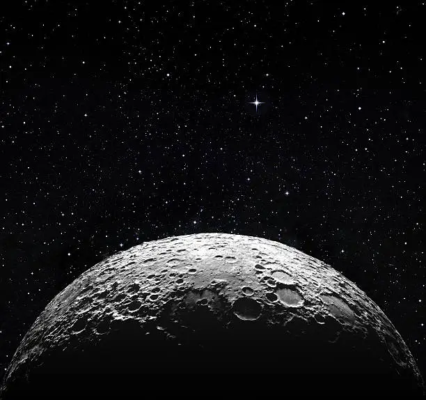 Photo of half moon surface and starry space