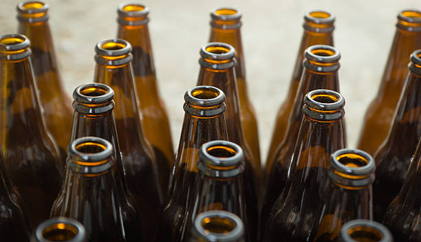 istock bottles of brown glass 470458078
