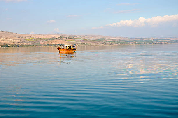 Tourist boat on the sea of galilea Tourist boat on the sea of galilea sea of galilee stock pictures, royalty-free photos & images