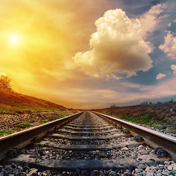 istock sunset over railroad to horizon 470464987