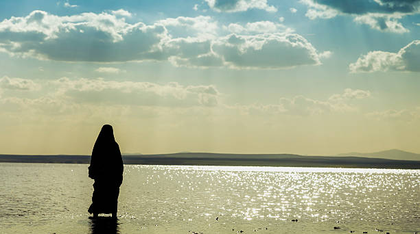 istock Woman walking on water 470466131