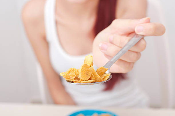 istock Teen eating cereal 470470751