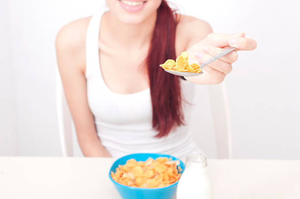 istock Teen eating cereal 470470815