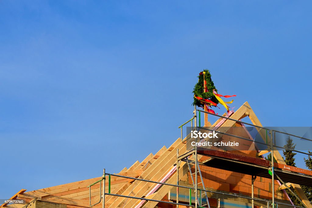 House construction House construction the directivity crown is set Topping Out Ceremony Stock Photo