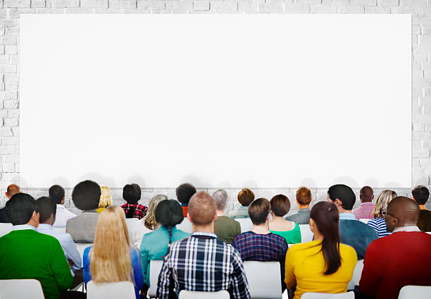 istock Audience looking at blank board at a conference or seminar 470482224