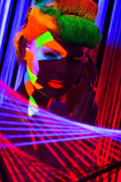 istock Women Portrait in Ultraviolet Light 470482389