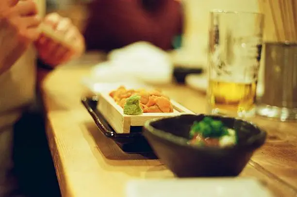 Sea Urchin at Restaurant with beer and side dish