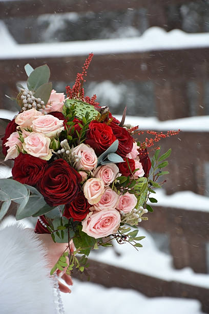 istock The bride's bouquet with different roses. Winter season 470482590