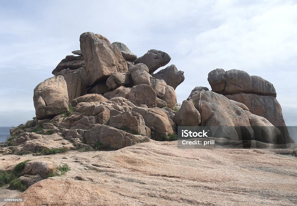 around Perros-Guirec granite boulders around Perros-Guirec at the Pink Granite Coast in Brittany, France Boulder - Rock Stock Photo