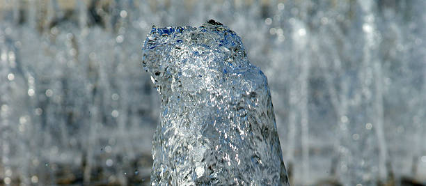 istock Large vertical water jet fountain 470494103