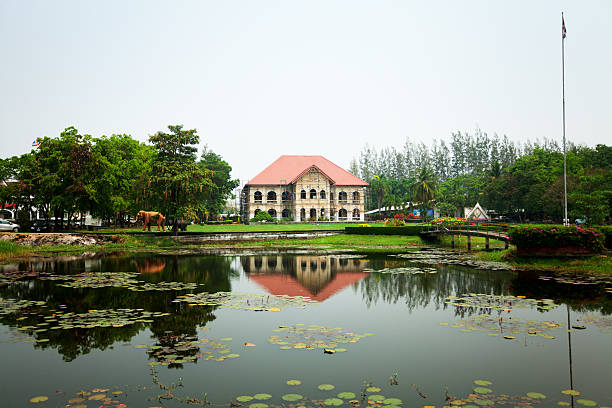 Udon Thani, Thailand - March 19, 2015: Park with mere and Muang Udon Thani Museum in norhern Thailand, Isaan region.