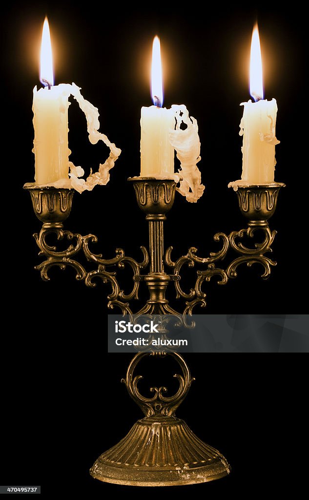 Candlestick holder with candles candlestick holder with three candles Candlestick Holder Stock Photo