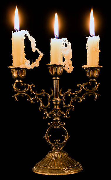 Candlestick holder with candles candlestick holder with three candles candlestick holder photos stock pictures, royalty-free photos & images