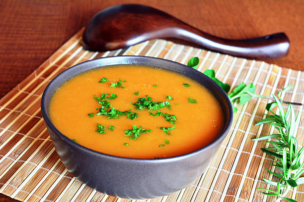 istock Creamy Butternut Squash Soup In Ceramic Bowl 470495800