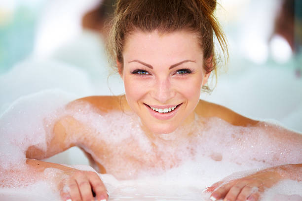 istock Gorgeous young woman lying in a bath tub 470507763