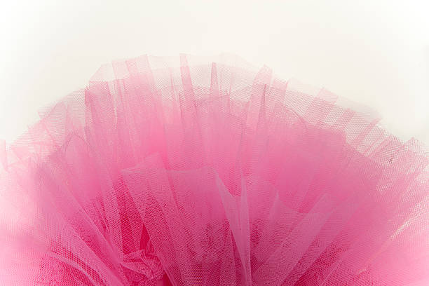 Beautiful layers of delicate pink fabric, isolated on white background