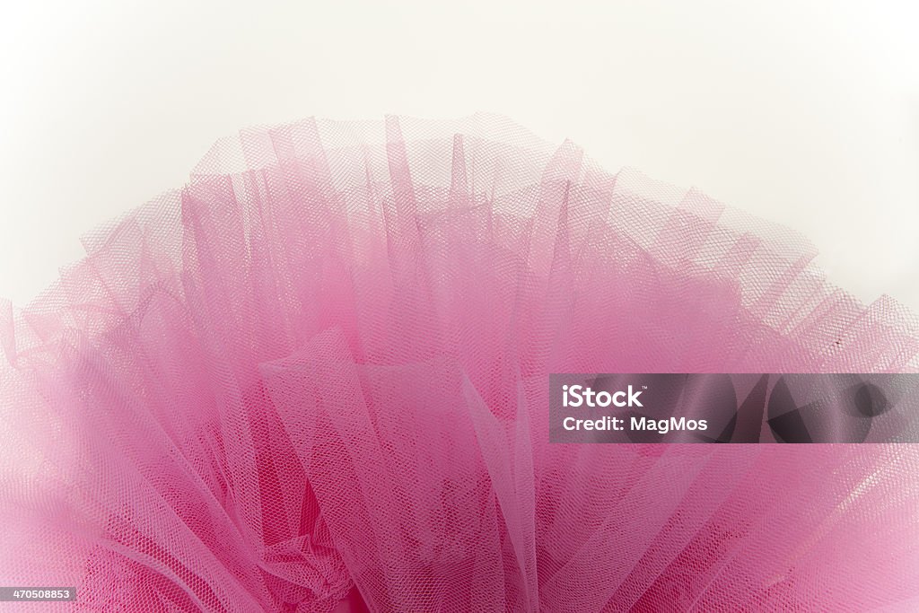 Beautiful layers of delicate pink fabric Beautiful layers of delicate pink fabric, isolated on white background Tutu Stock Photo
