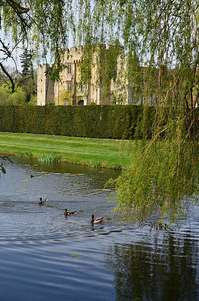 Hever Castle Garden Hever Castle, United Kingdom - April 16, 2015: The beautiful gardens at Hever with the Castle in the background. Hever Castle stock pictures, royalty-free photos & images