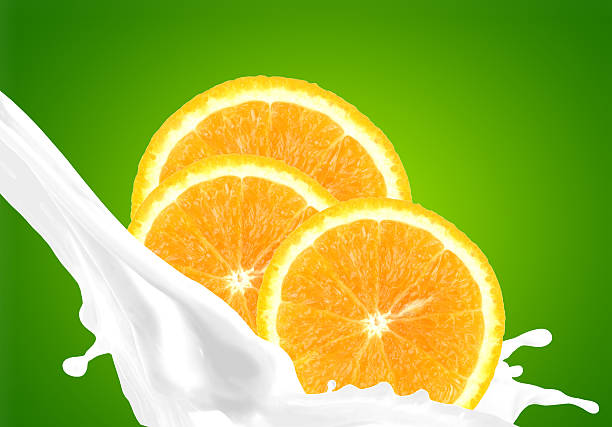 Splashing milk with orange