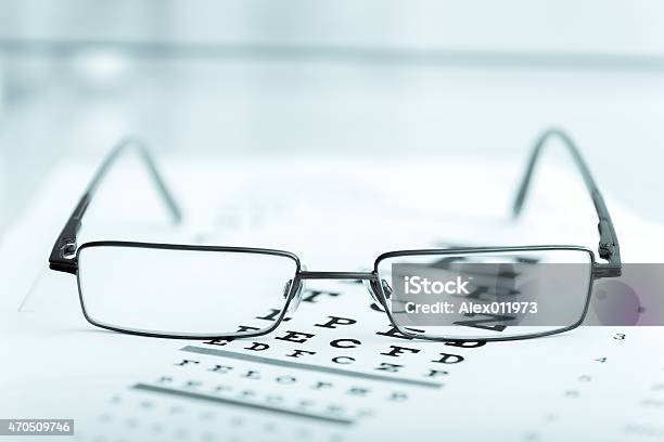 Clear Black Modern Glasses On A Eye Sight Test Chart Stock Photo - Download Image Now