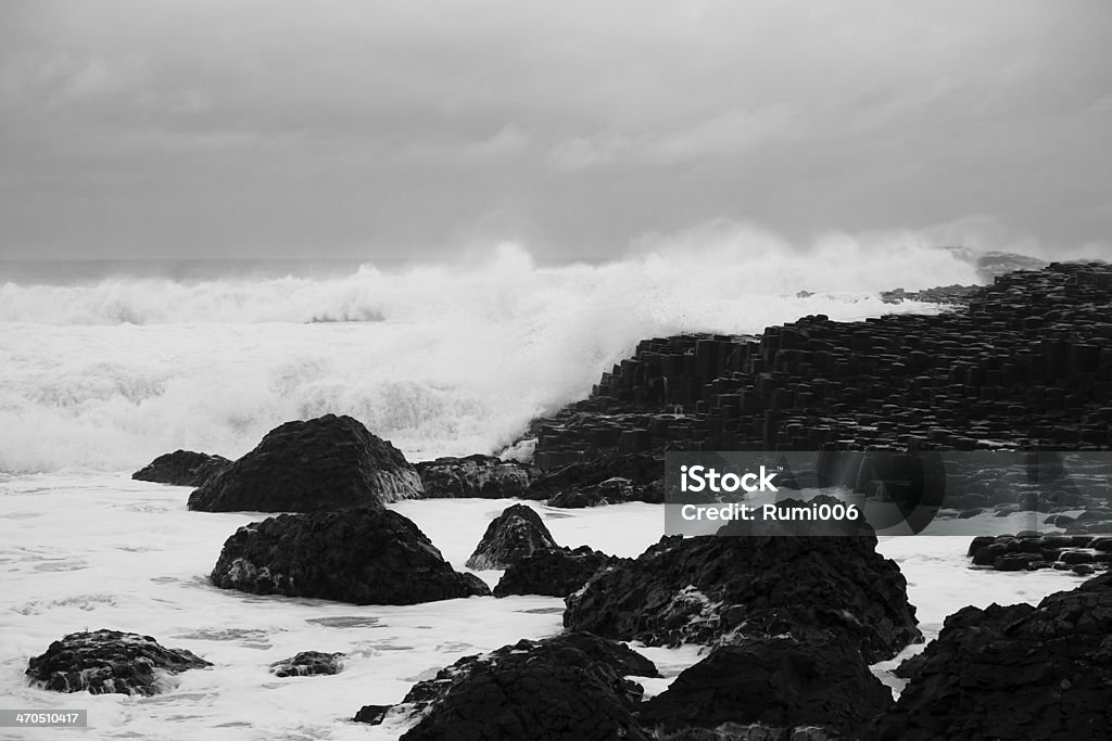 Giant's Causeway Giant's Causeway, Northern Ireland, Travel, Tourism, Nature, Sea, Seaside, Black and White, Famous Place, Irish Culture, Scenics, Geology, Beach, Coastline, World Heritage, Rock, Irish Sea, Flowing Water, Fantasy Beach Stock Photo