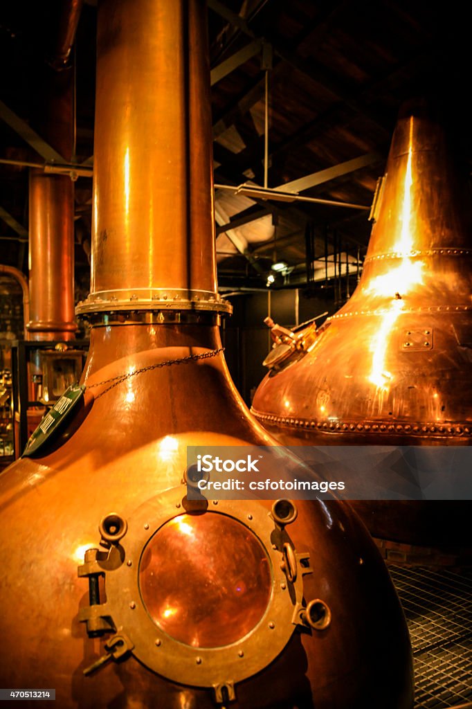 Copper Whiskey vats at a distillery Dublin, Eire - November 18, 2013: Copper fermentation vats at an Irish Whiskey distillery Distillery Stock Photo