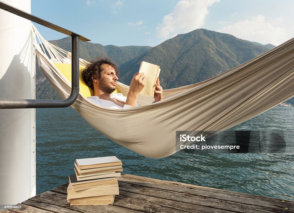 portrait of a man portrait of young man on the dock of Lake Book Stock Photo