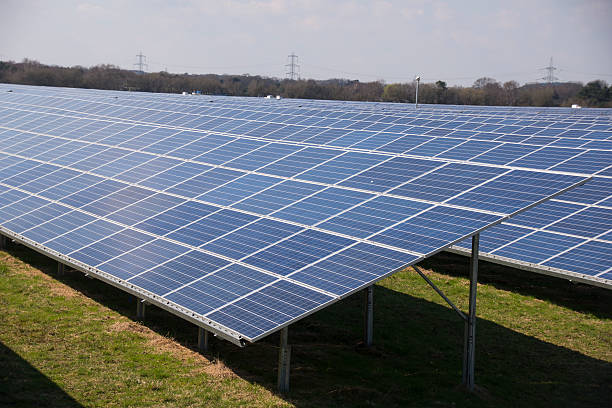istock View across large solar panels in a solar farm 470517670