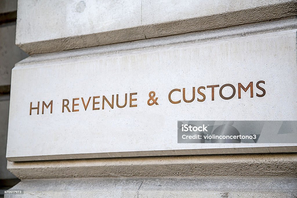 HM Revenue & Customs Sign, Westminster, London HM Revenue & Customs sign incised into the wall outside their headquarters in Whitehall, City of Westminster, London HM Revenue and Customs Stock Photo