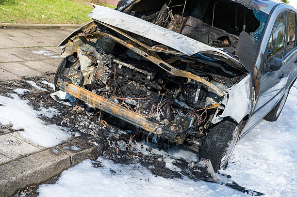 istock Burned-out car on the road 470518520
