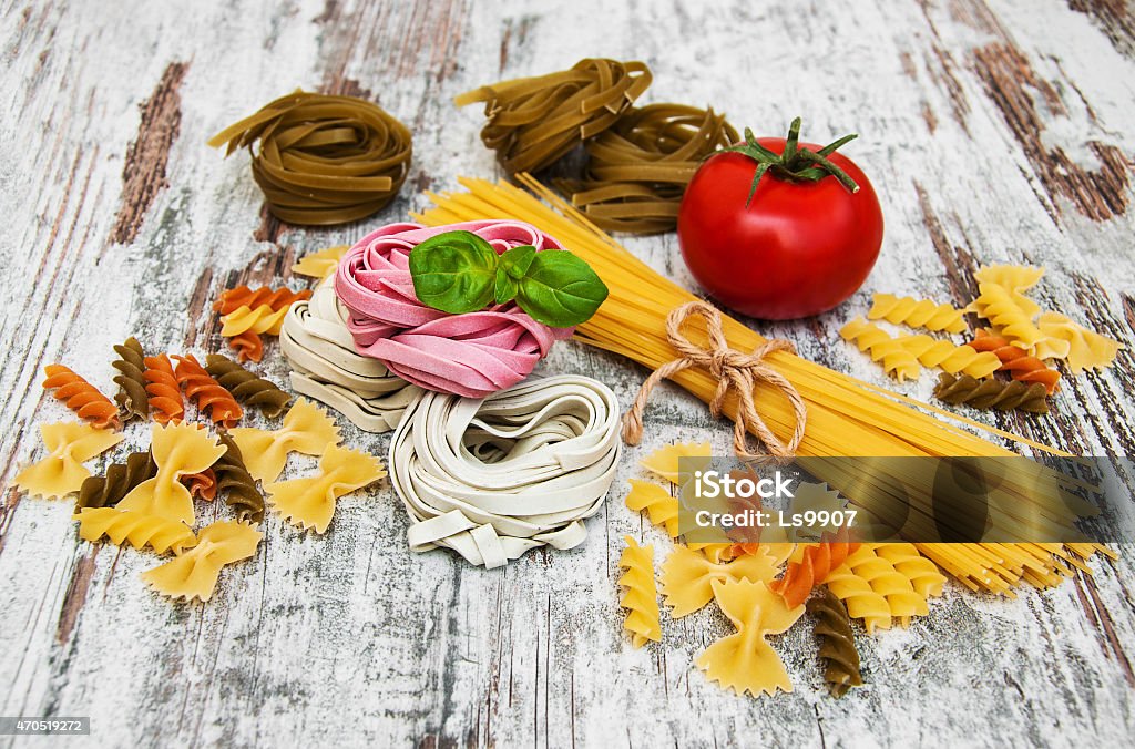 different types of pasta different types of pasta on a old wooden background 2015 Stock Photo