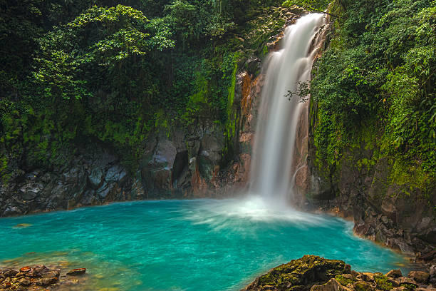 beautiful rio celeste waterfall - costa rica stok fotoğraflar ve resimler