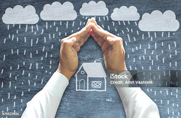 Hands Protecting House Stock Photo - Download Image Now - Storm, House, Rain