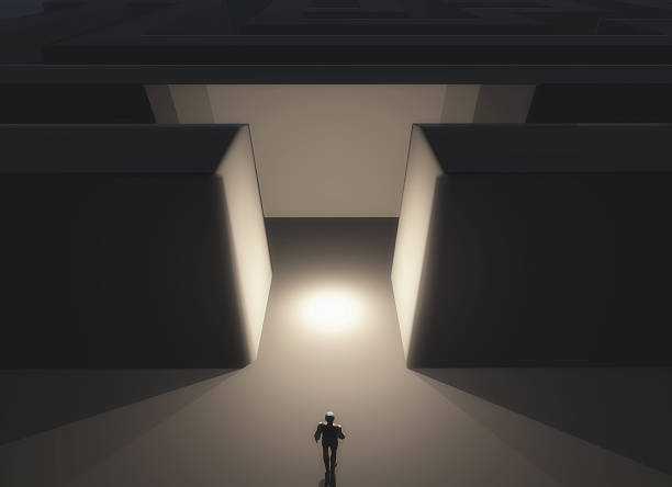 istock 3D male figure in front of a maze 470523202