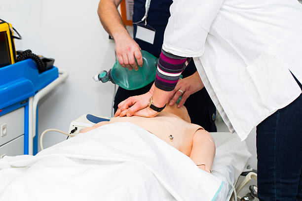 istock First aid CPR seminar,mechanical ventilation of dummy 470523502