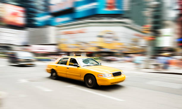 istock taxi running on manhattan 470523770