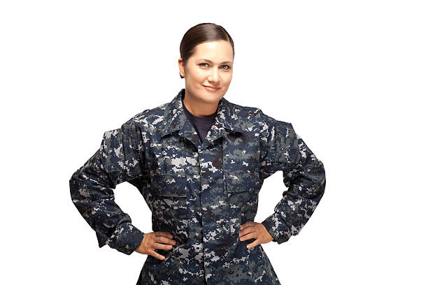istock Smiling female in navy uniform with hands on hips 470524152