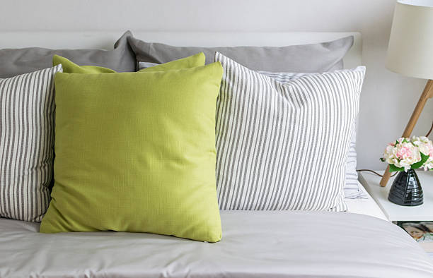istock modern bedroom with green pillow on bed 470535136