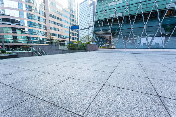 istock Empty pavement by the side of office building 470539340
