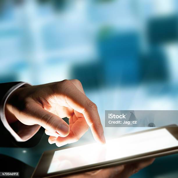 Man Hand Touching The Screen Stock Photo - Download Image Now - Defocused, Digital Tablet, Touching