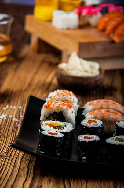 istock Japanese sushi on the old wooden table 470547037