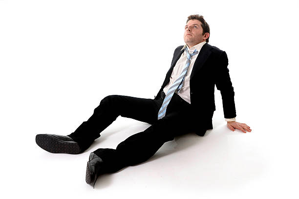 istock Young Business Man in Stress on the floor 470547099