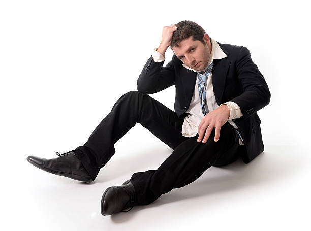 istock Young Business Man in Stress on the floor 470547159